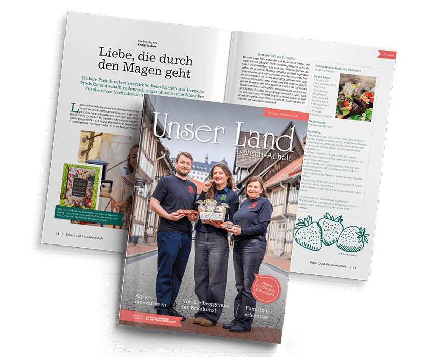 Magazine cover for Unser Land Sachsen-Anhalt, showing three people smiling and holding products on a street backdrop.